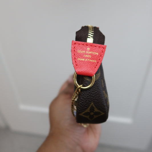 LOUIS VUITTON Monogram Mini Pochette Vivienne in London