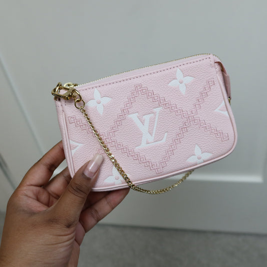 LOUIS VUITTON Pink Bicolor Empreinte Mini Pochette