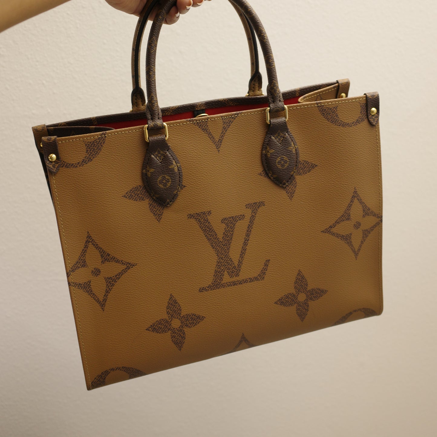Louis Vuitton OntheGo MM Reverse Monogram with Leather Handles