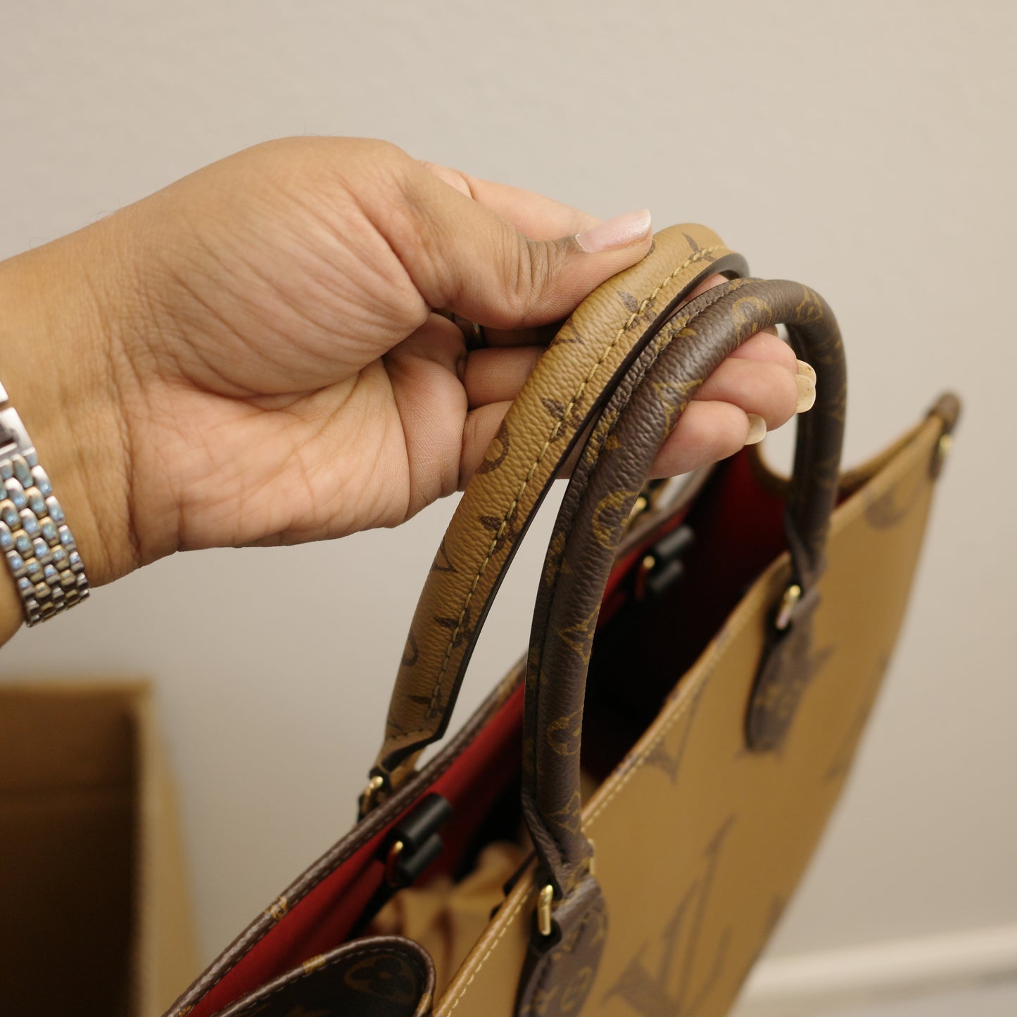 Louis Vuitton OntheGo MM Reverse Monogram with Leather Handles