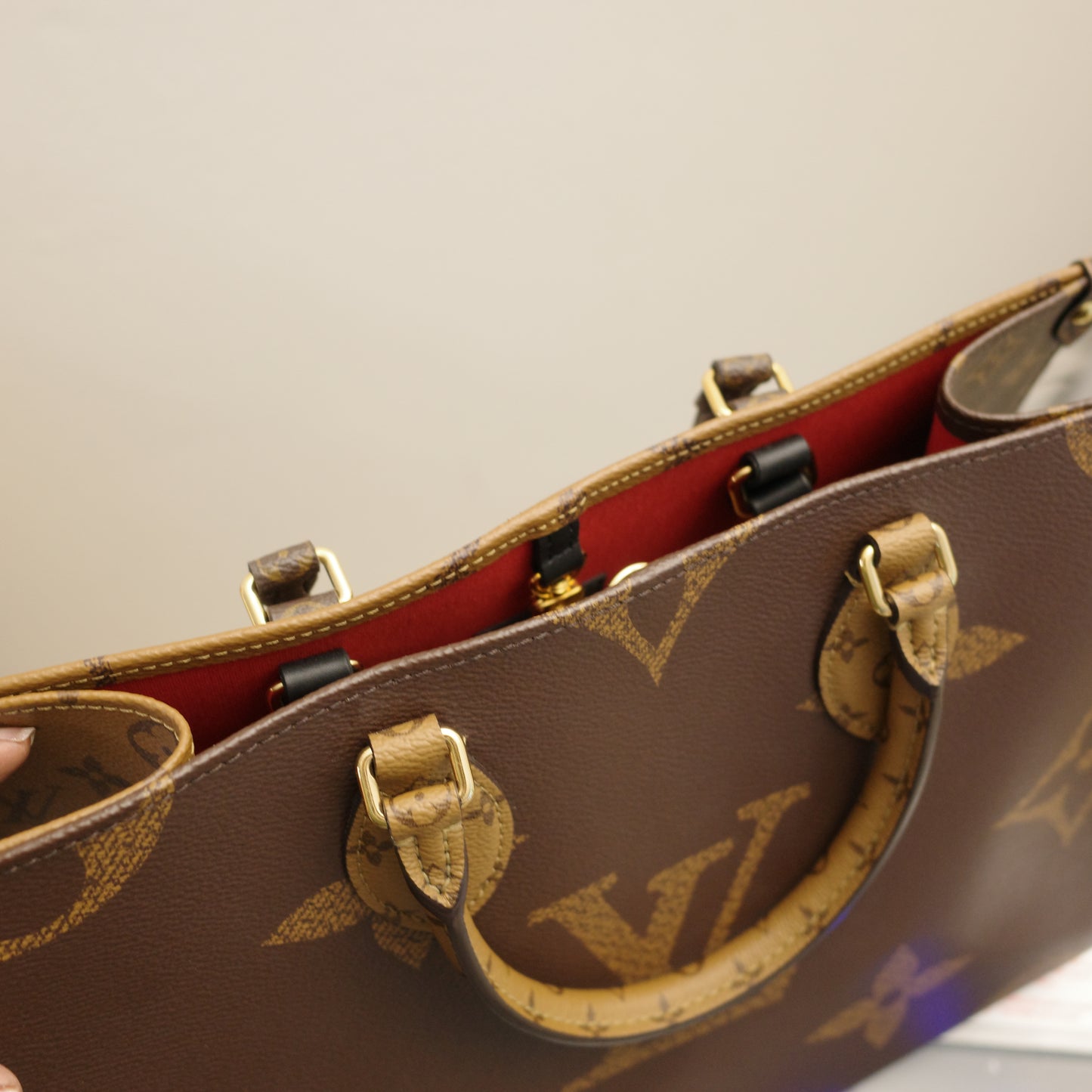 Louis Vuitton OntheGo MM Reverse Monogram with Leather Handles