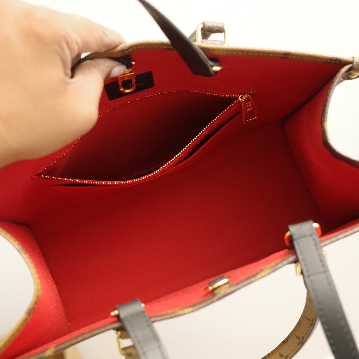 Louis Vuitton OntheGo MM Reverse Monogram with Leather Handles