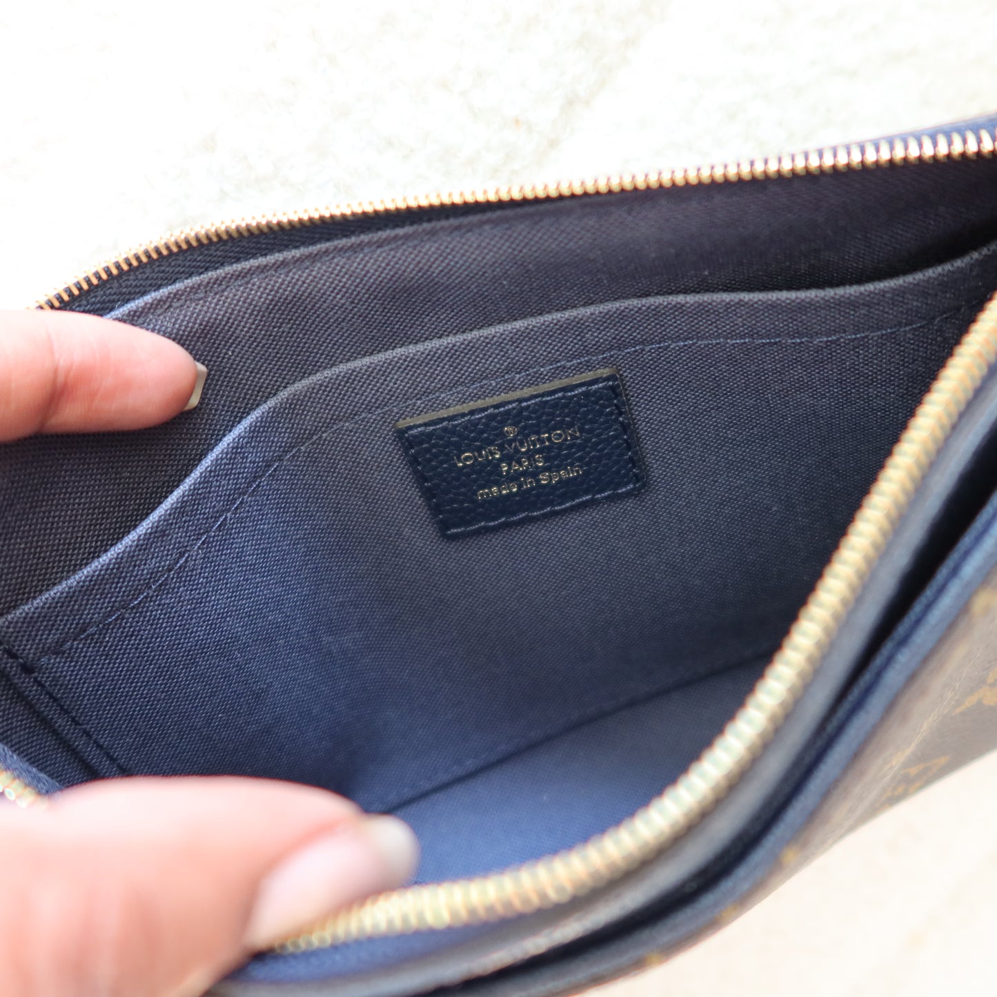 LOUIS VUITTON Monogram Navy Pallas Clutch