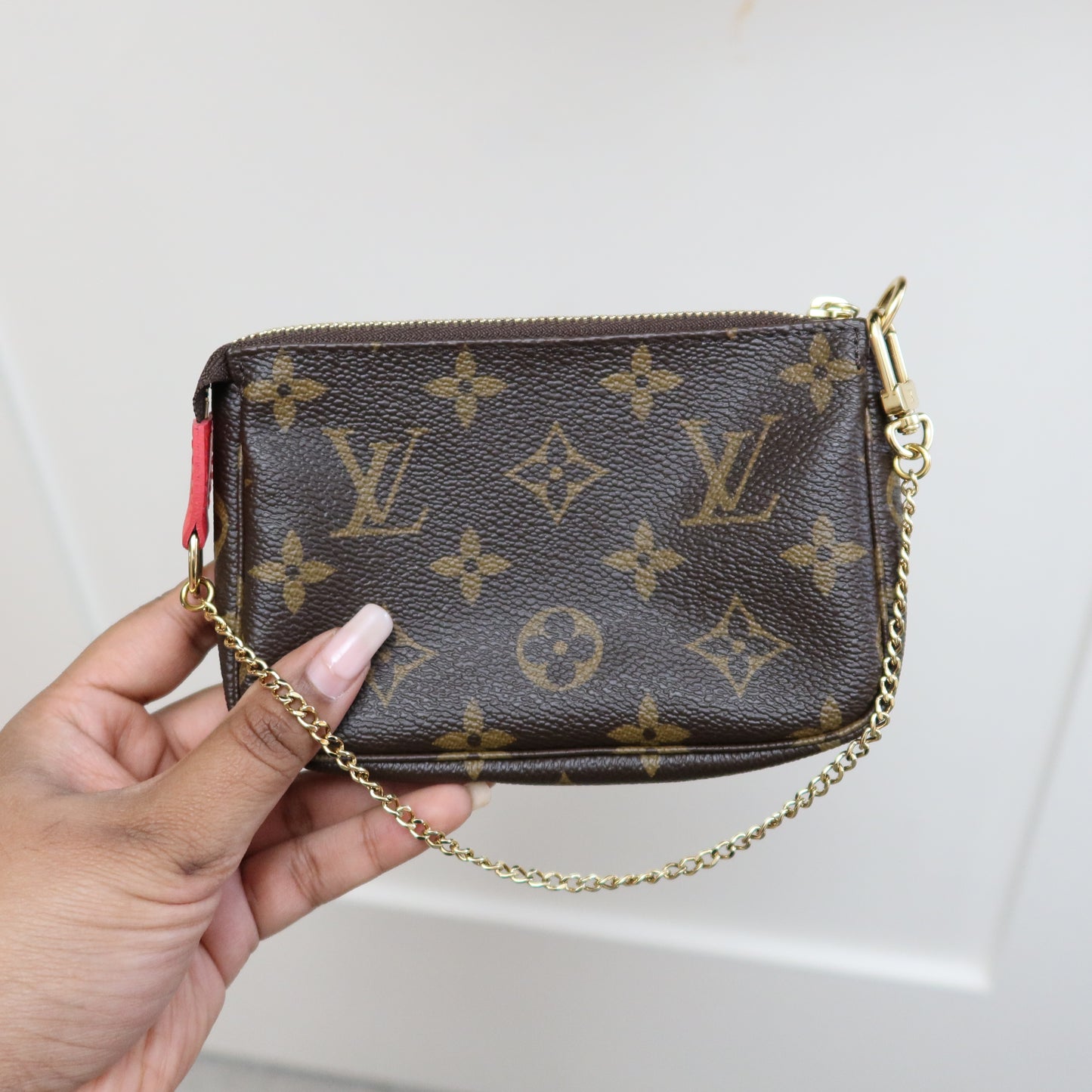 LOUIS VUITTON Monogram Mini Pochette Vivienne in London