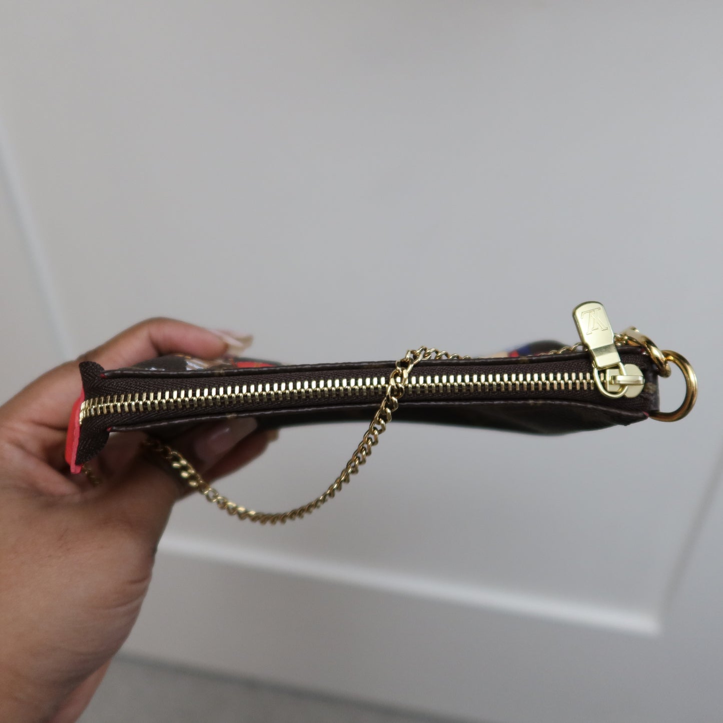LOUIS VUITTON Monogram Mini Pochette Vivienne in London