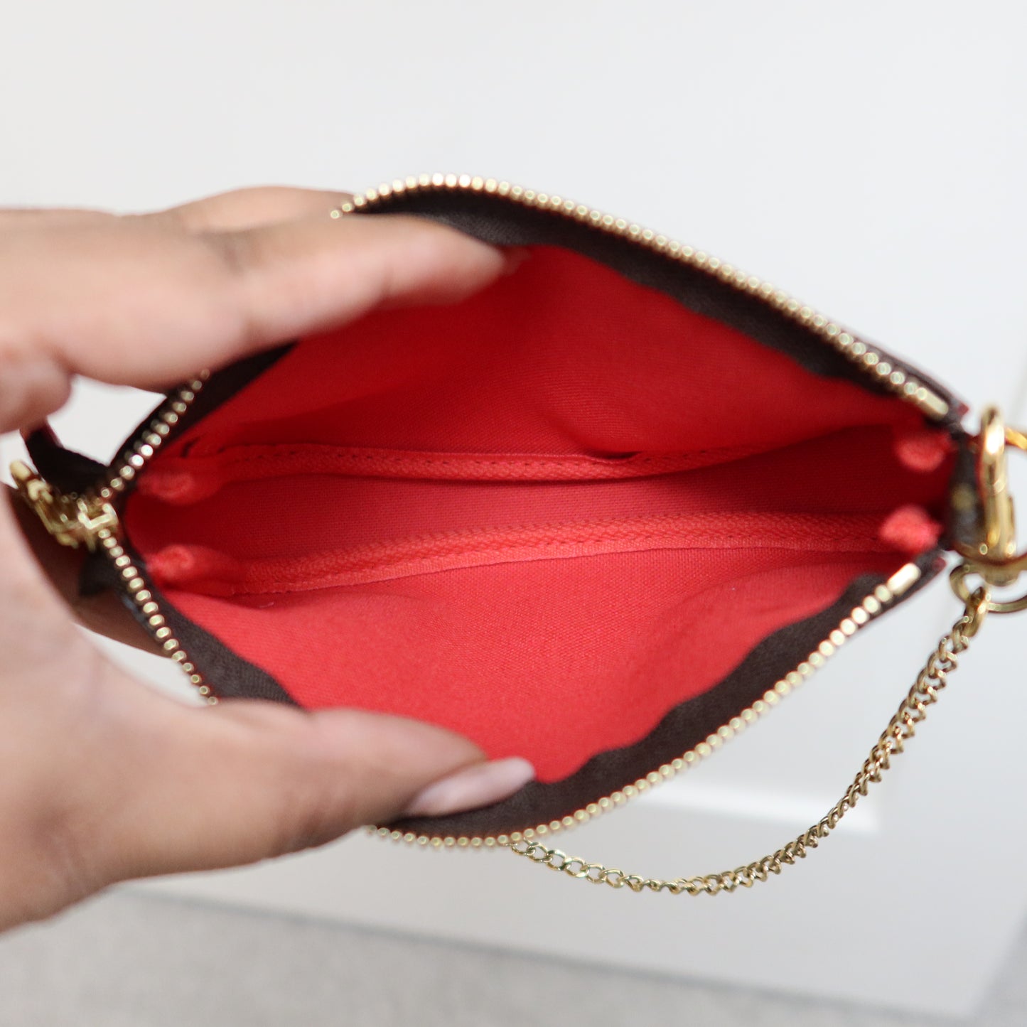 LOUIS VUITTON Monogram Mini Pochette Vivienne in London