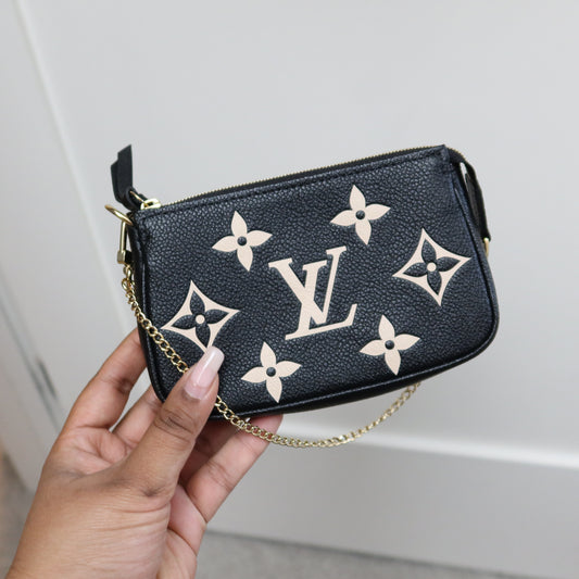 LOUIS VUITTON Black Bicolor Empreinte Mini Pochette