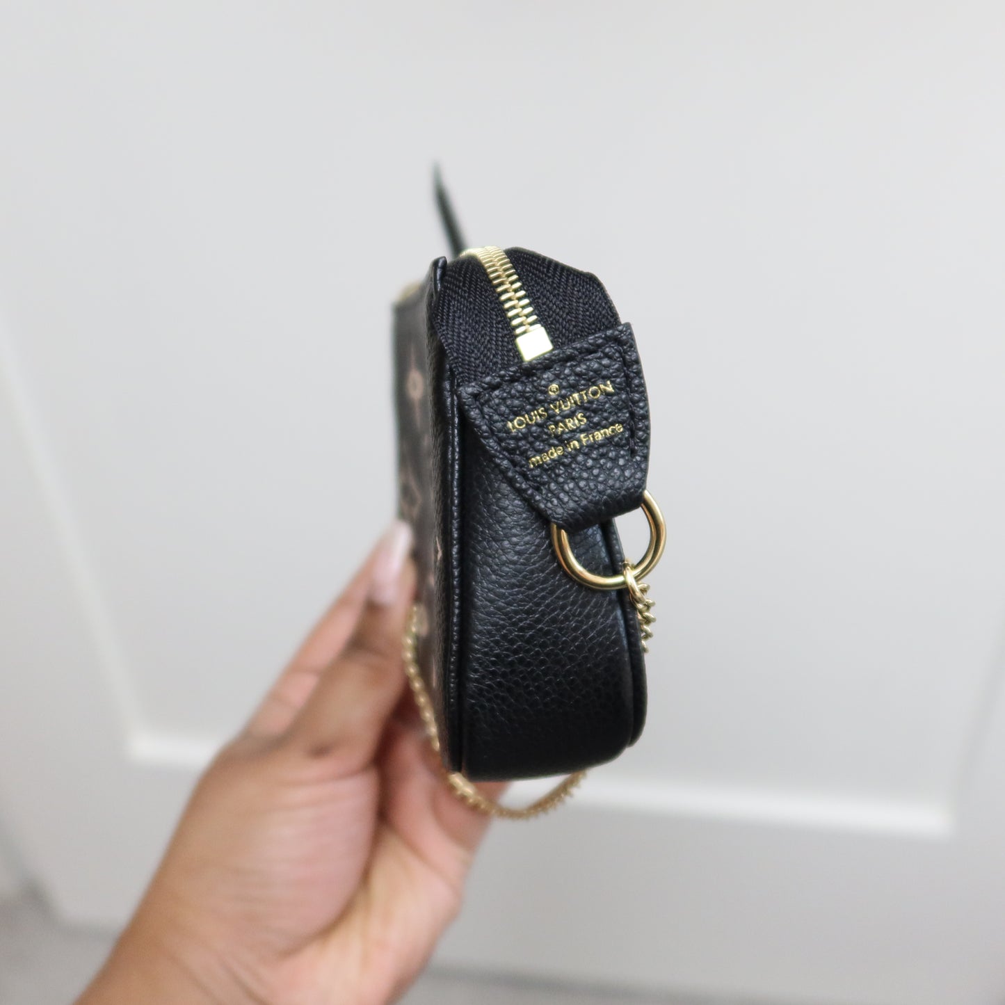 LOUIS VUITTON Black Bicolor Empreinte Mini Pochette