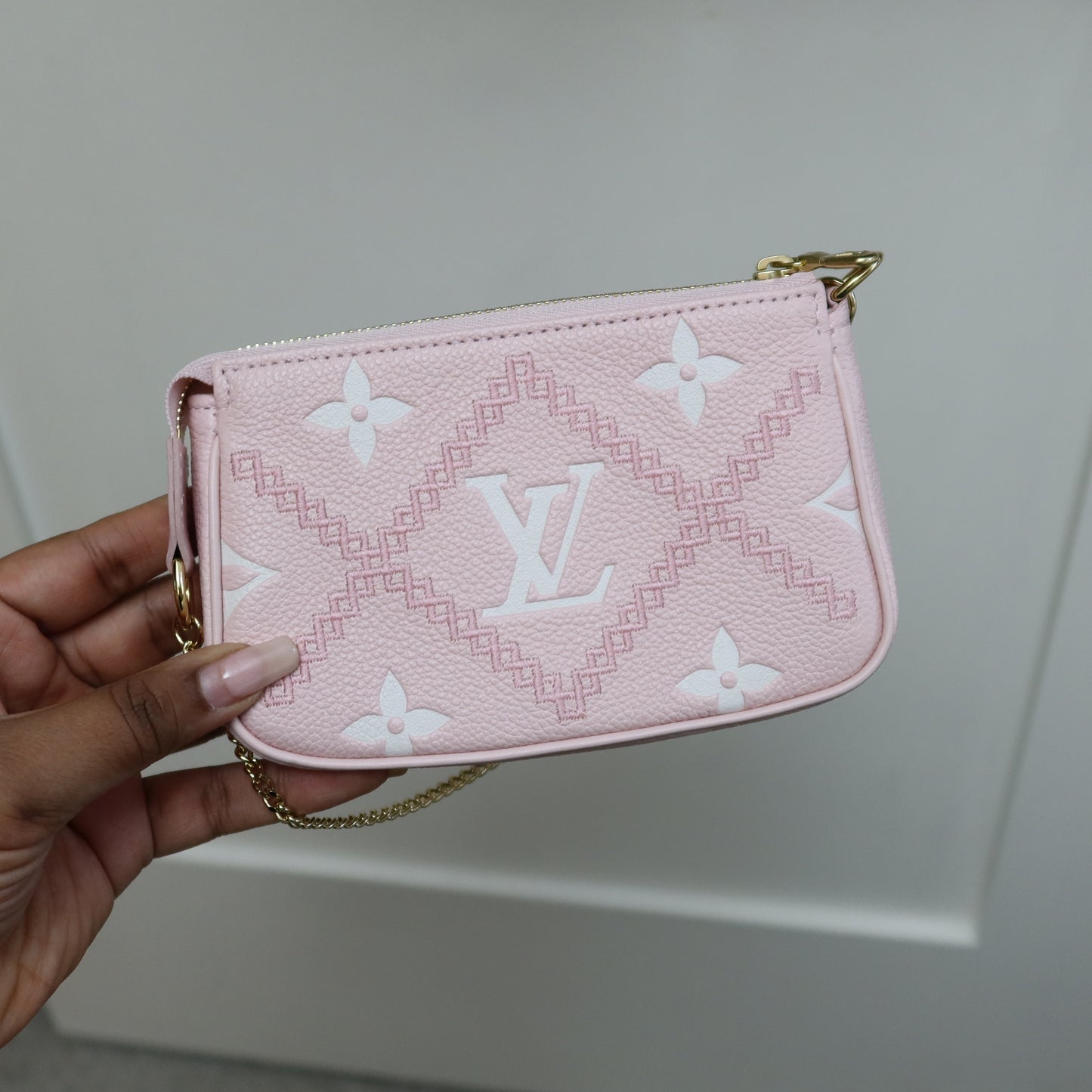 LOUIS VUITTON Pink Bicolor Empreinte Mini Pochette