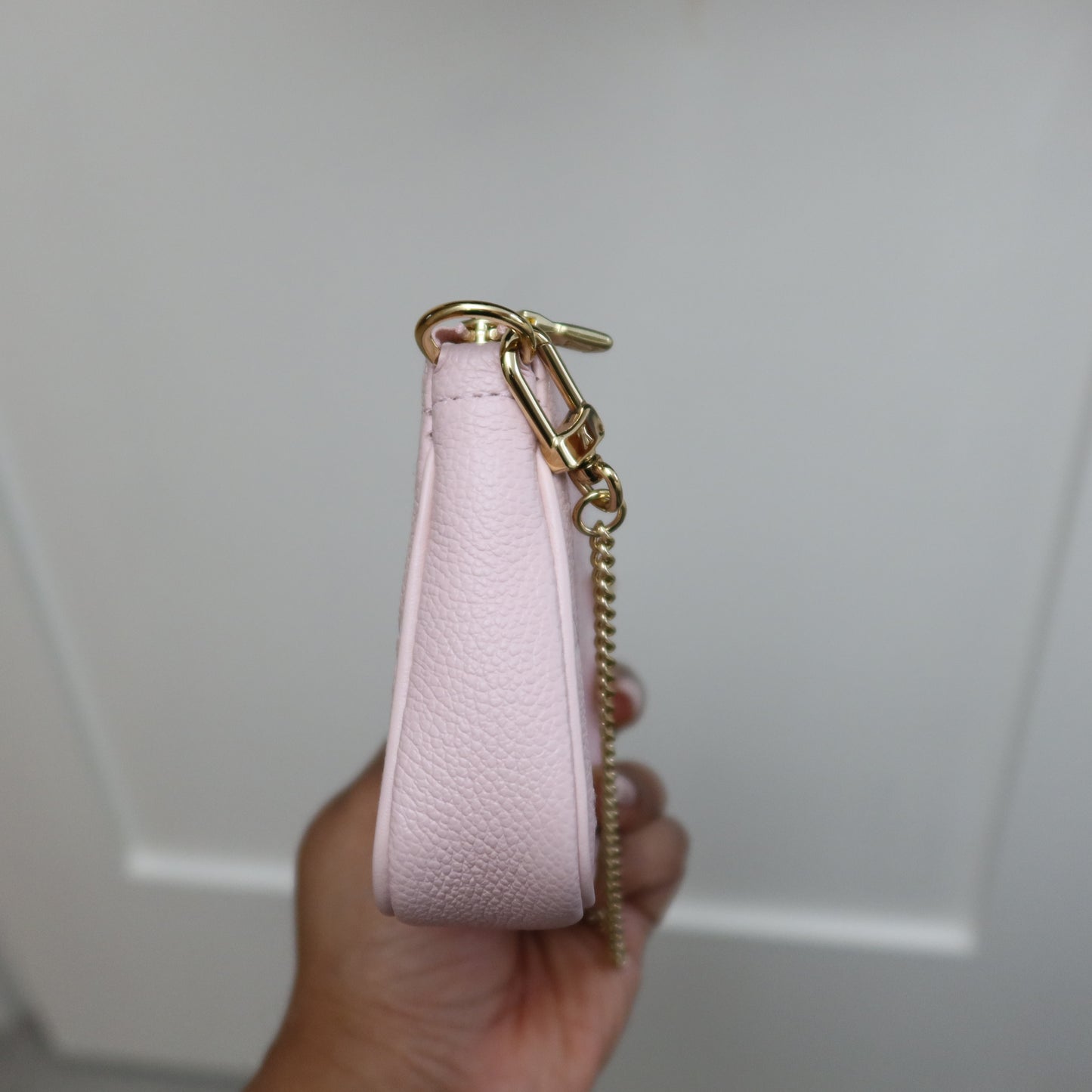 LOUIS VUITTON Pink Bicolor Empreinte Mini Pochette