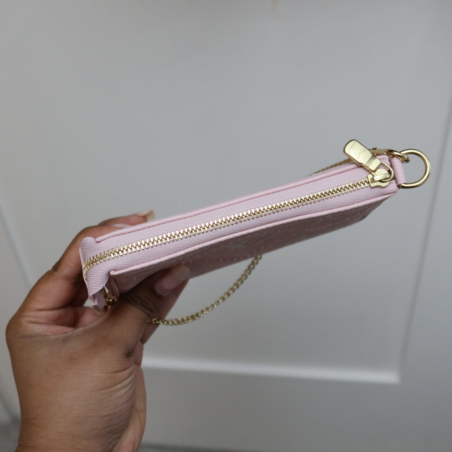 LOUIS VUITTON Pink Bicolor Empreinte Mini Pochette